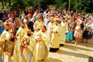 увеличить